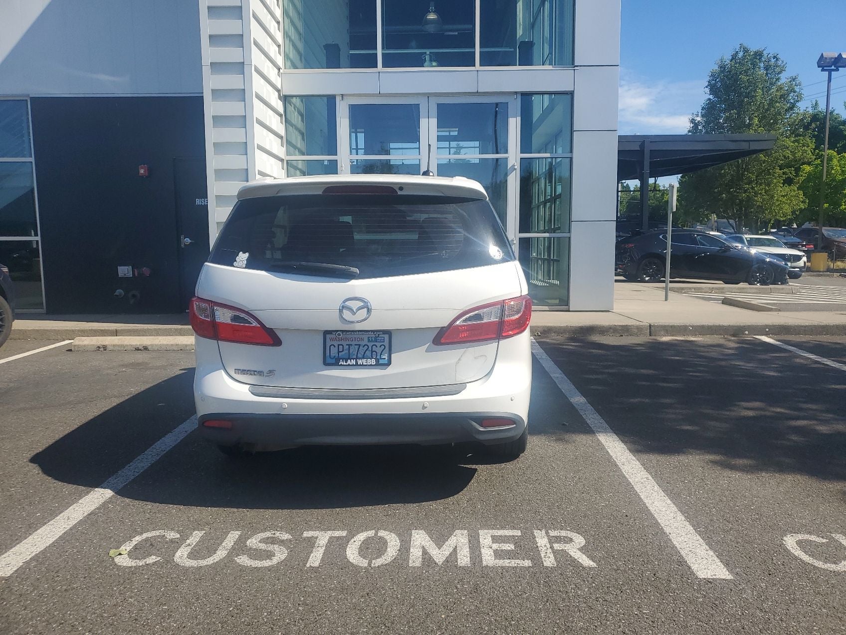 2014 Mazda Mazda5 — rear three-quarter view